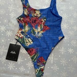 Vibrant Blue and Red One Piece Swimsuit with High-Cut Design